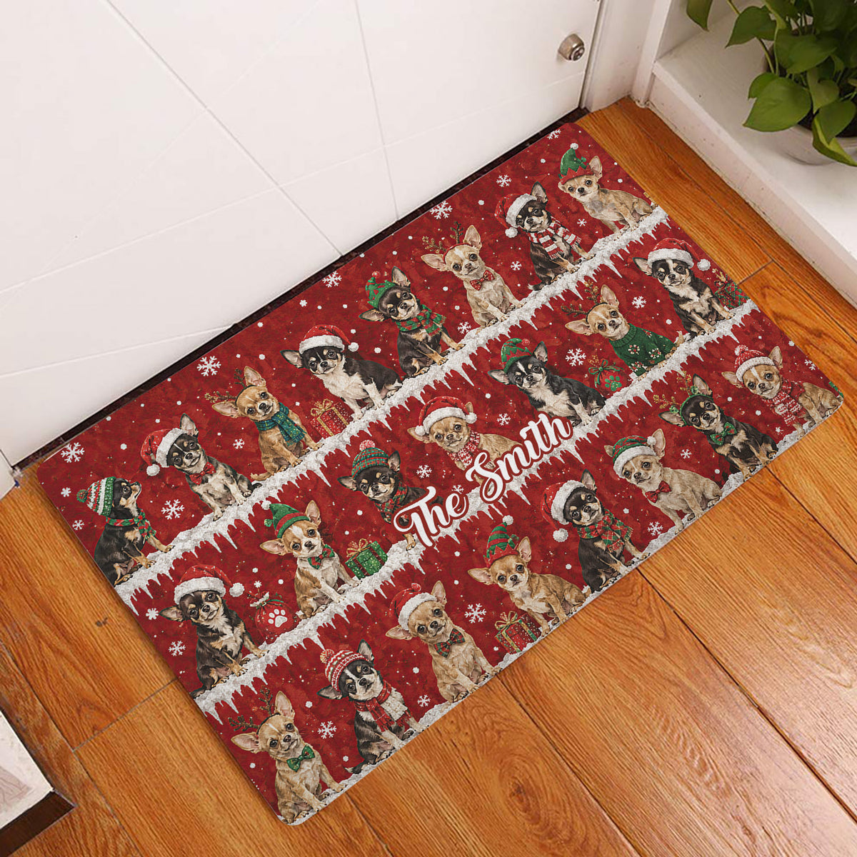 Chihuahua Christmas doormat displayed in an indoor entryway on a warm wood floor