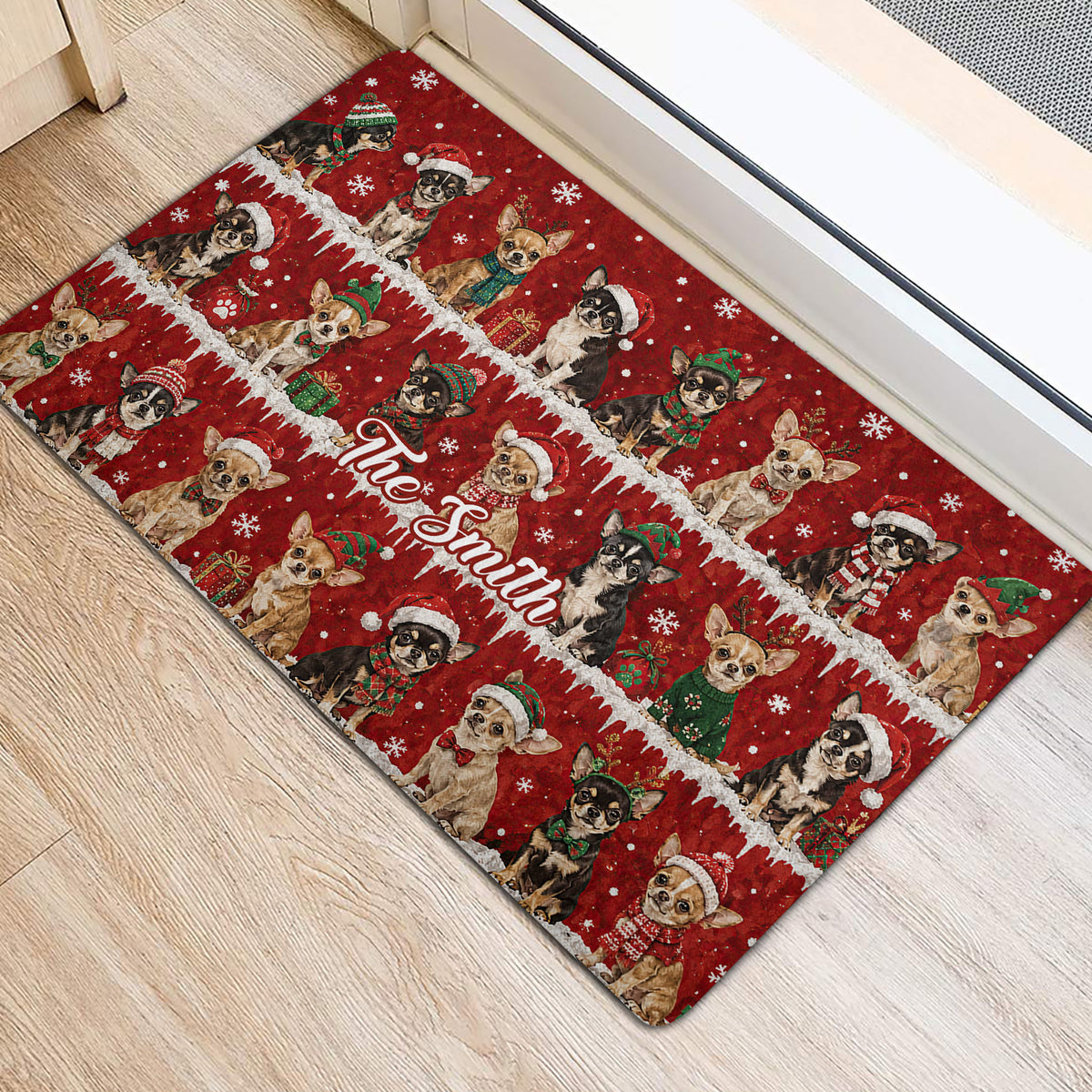 Red Christmas Chihuahua door mat positioned beside an interior doorway on light flooring