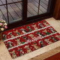 Festive Chihuahua entryway rug displayed near a glass door with snowy holiday artwork