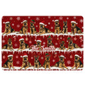 Christmas German Shepherd doormat design with Santa hats, snowflakes, ornaments, stockings, and red background