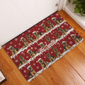 German Shepherd Christmas doormat displayed at an indoor entryway beside a white door and wood floor