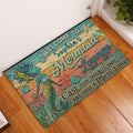 Mermaid entryway rug displayed beside a white door on a warm wood floor
