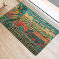 Mermaid door mat styled at an entrance with colorful underwater artwork and seashell details