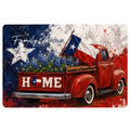 Texas doormat featuring a vintage red pickup truck, Texas flag, bluebonnets, star artwork, and rustic patriotic colors