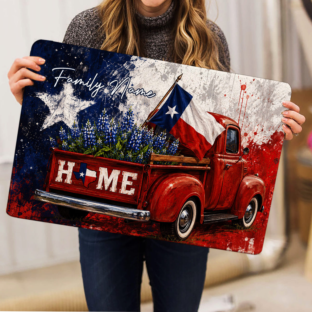 Texas doormat held indoors, displaying a vintage red pickup truck, Texas flag, bluebonnets, star artwork, and patriotic color palette