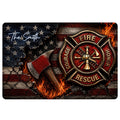 Firefighter doormat featuring a fire department emblem, crossed tools, flames, stars, and a flag-inspired background