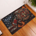 Firefighter doormat displayed at a home entrance on hardwood flooring with a bold red, black, and blue design