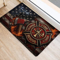 Firefighter entryway mat beside a door featuring a fire emblem, axe, flames, and star-spangled artwork