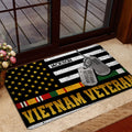 Vietnam Veteran door mat shown inside a glass doorway with patriotic flag artwork and military tribute details
