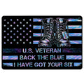Veteran doormat featuring military boots, stars, flag-inspired stripes, and vivid blue, purple, and pink artwork