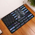 Veteran doormat displayed at an entryway with military boots, stars, and colorful flag-inspired artwork