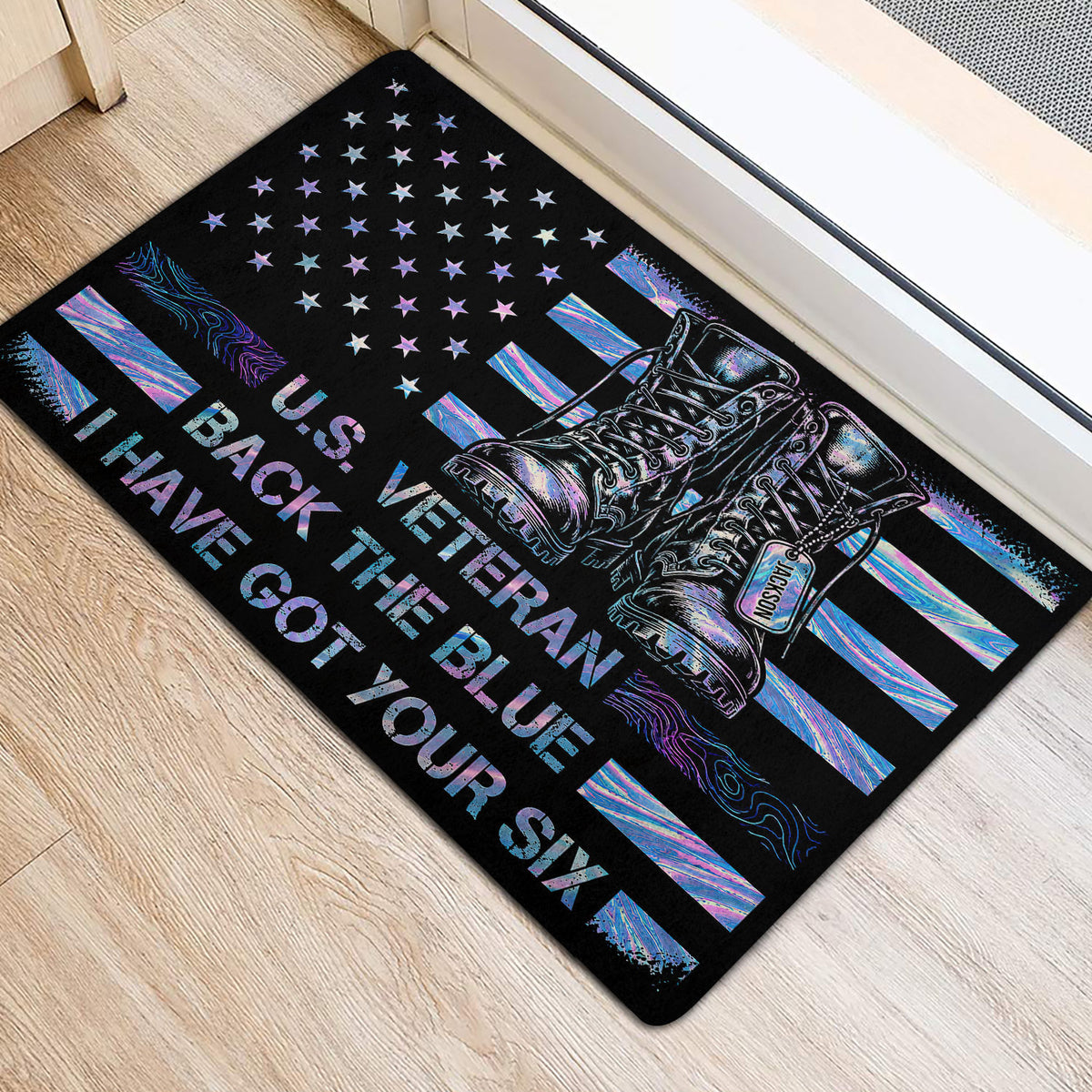 Veteran entryway rug shown beside a doorway with boots, stars, and bold patriotic artwork
