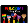 Black LGBT welcome doormat with colorful pride lettering and diverse hands holding heart symbols