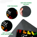 Close-up feature view of the LGBT welcome doormat's printed surface and rubber backing