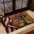 Patriotic veteran door mat styled inside a home entrance with combat boots, American flags, and colorful flowers