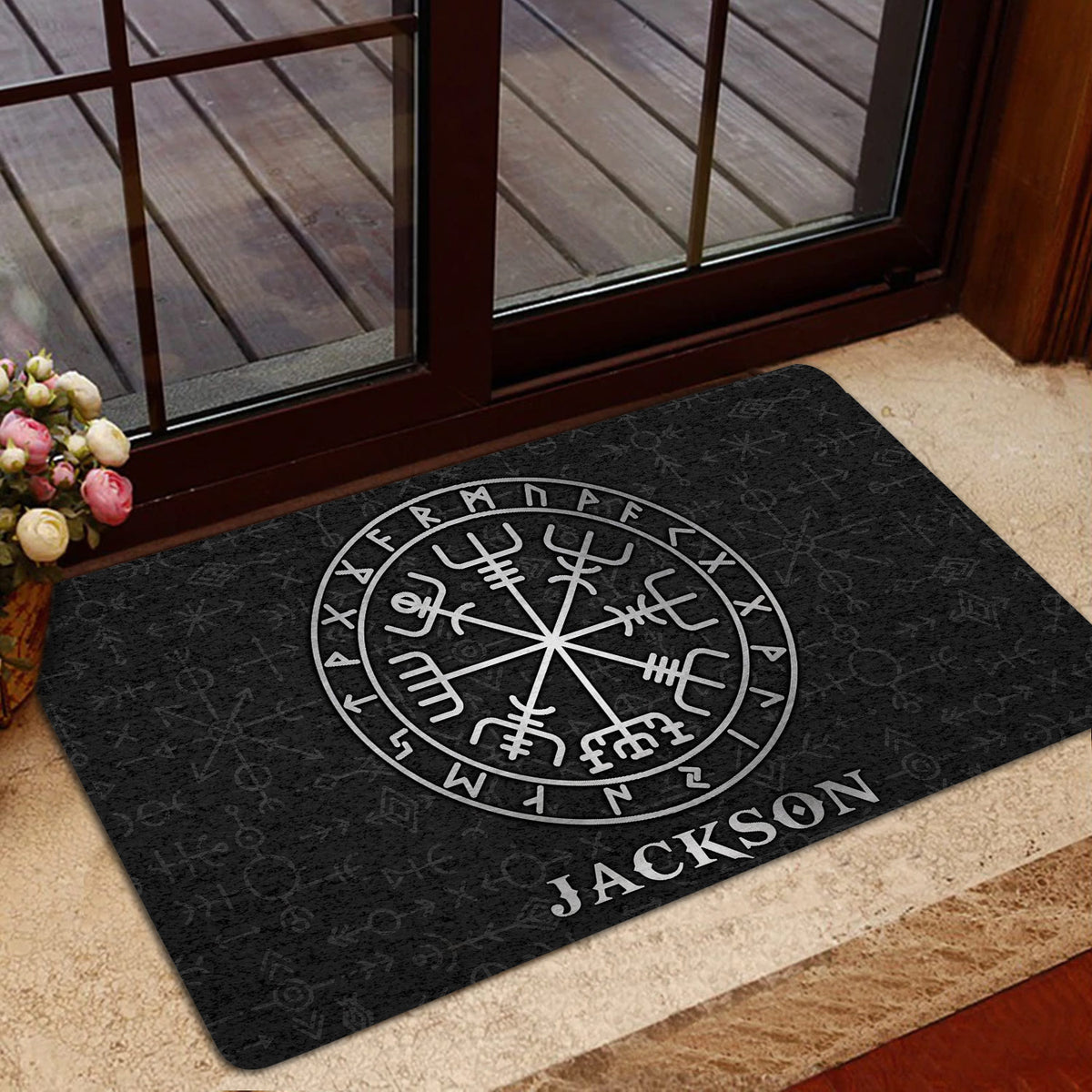 Viking door mat styled in an indoor entryway with circular Norse artwork and runic details