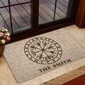 Viking doormat with Norse symbols styled in a home entryway beside glass doors