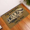 Travel trailer camping doormat displayed at a home entrance on a wood floor