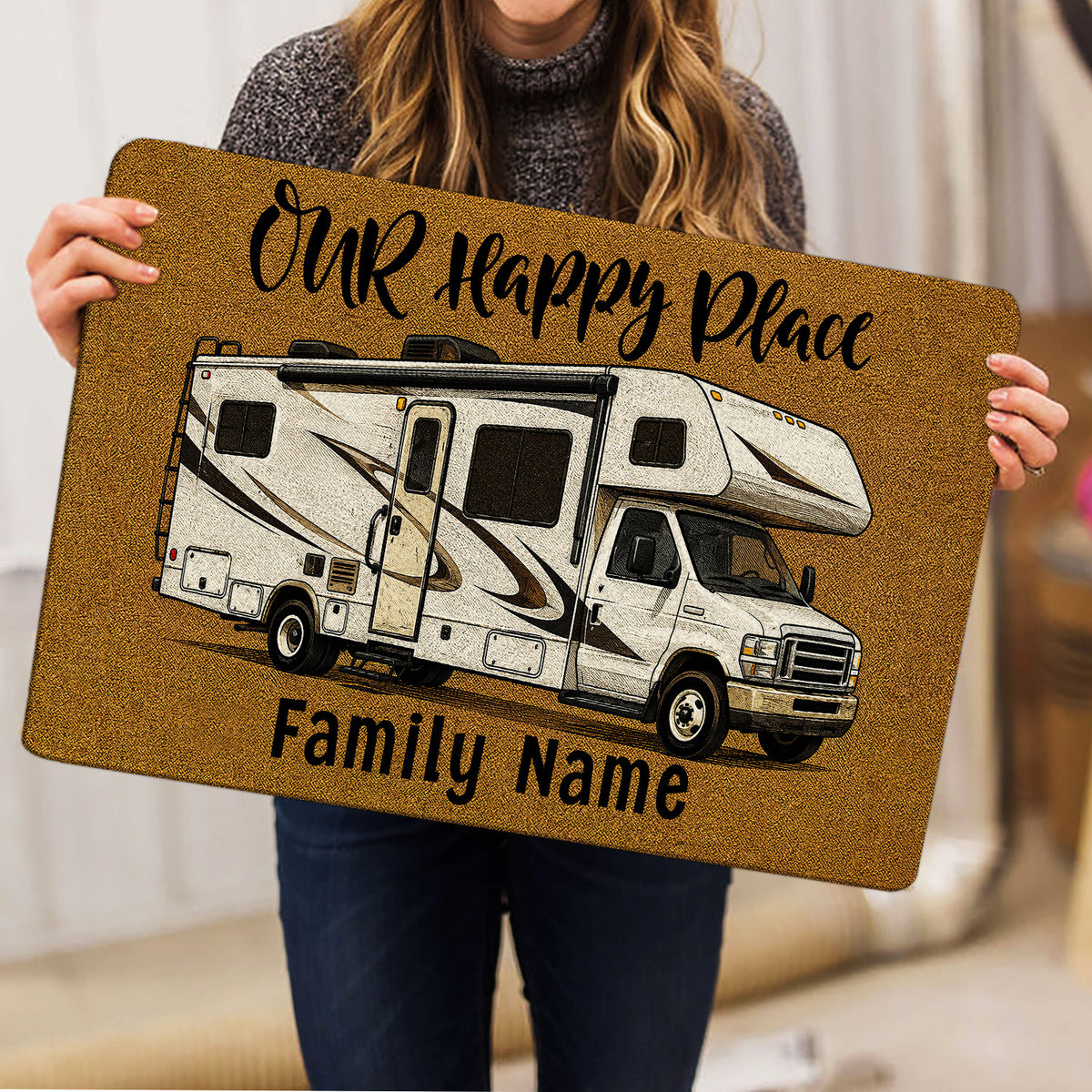Camping RV doormat held indoors, showing a detailed camper illustration and welcoming family entryway artwork