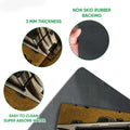 Close-up of the camping doormat artwork with visible rubber backing and textured surface details