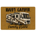 Camping doormat with a recreational vehicle illustration, golden background, and bold welcome artwork