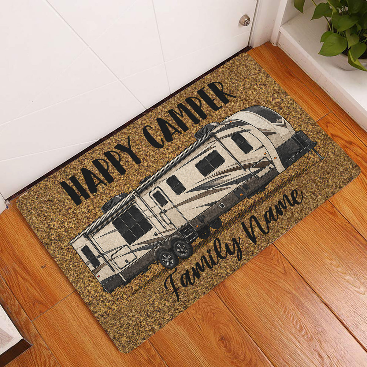 Camping RV doormat styled at an indoor doorway with warm brown artwork and a travel trailer illustration