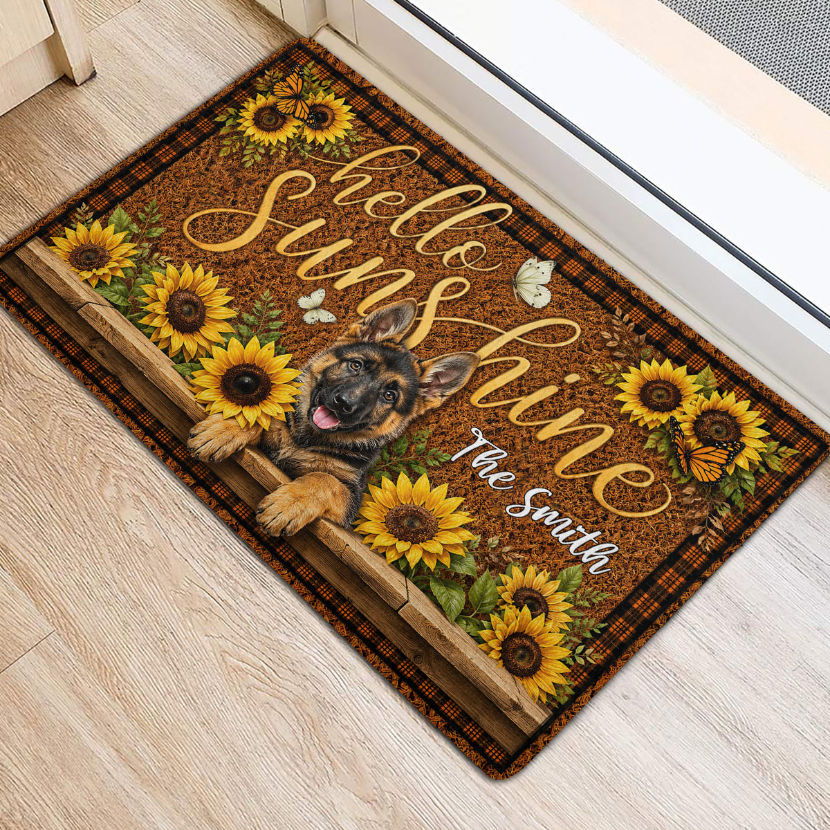 German Shepherd welcome mat displayed beside a doorway with sunflowers, butterflies and rustic decor