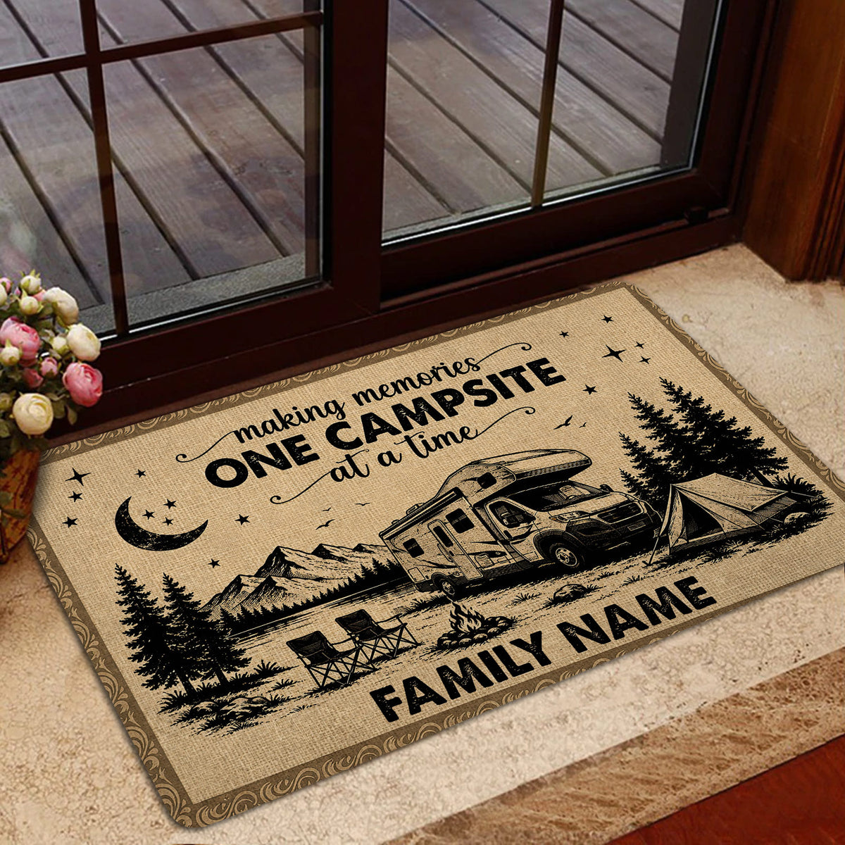 Camping doormat staged by a glass door with an RV, tent, campfire and mountain campsite artwork