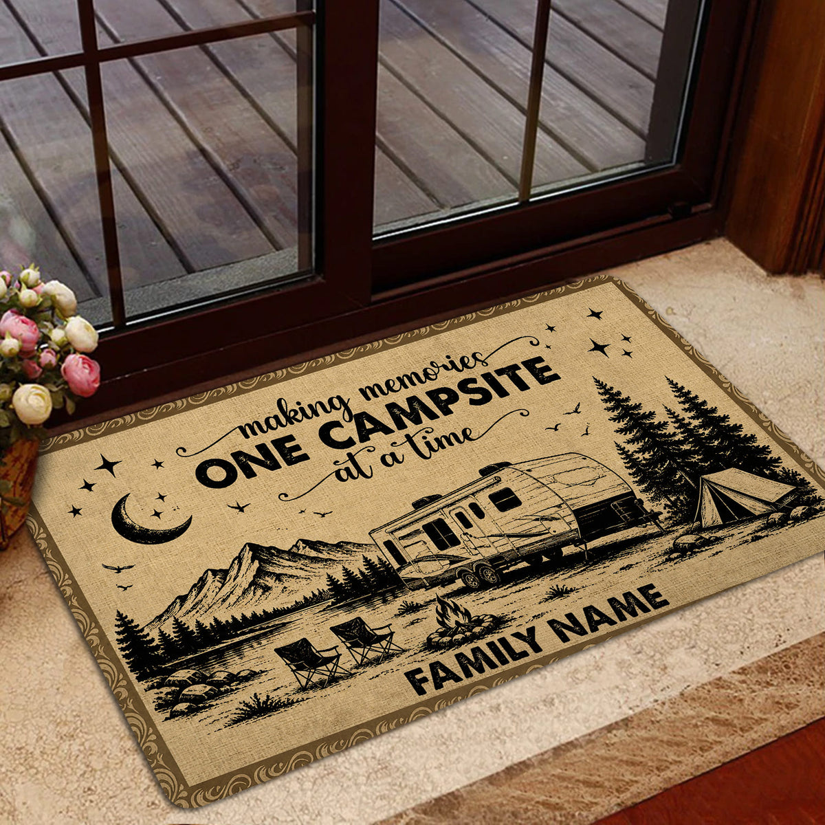 Camping-themed entryway mat by a glass door with RV, tent, campfire and mountain artwork