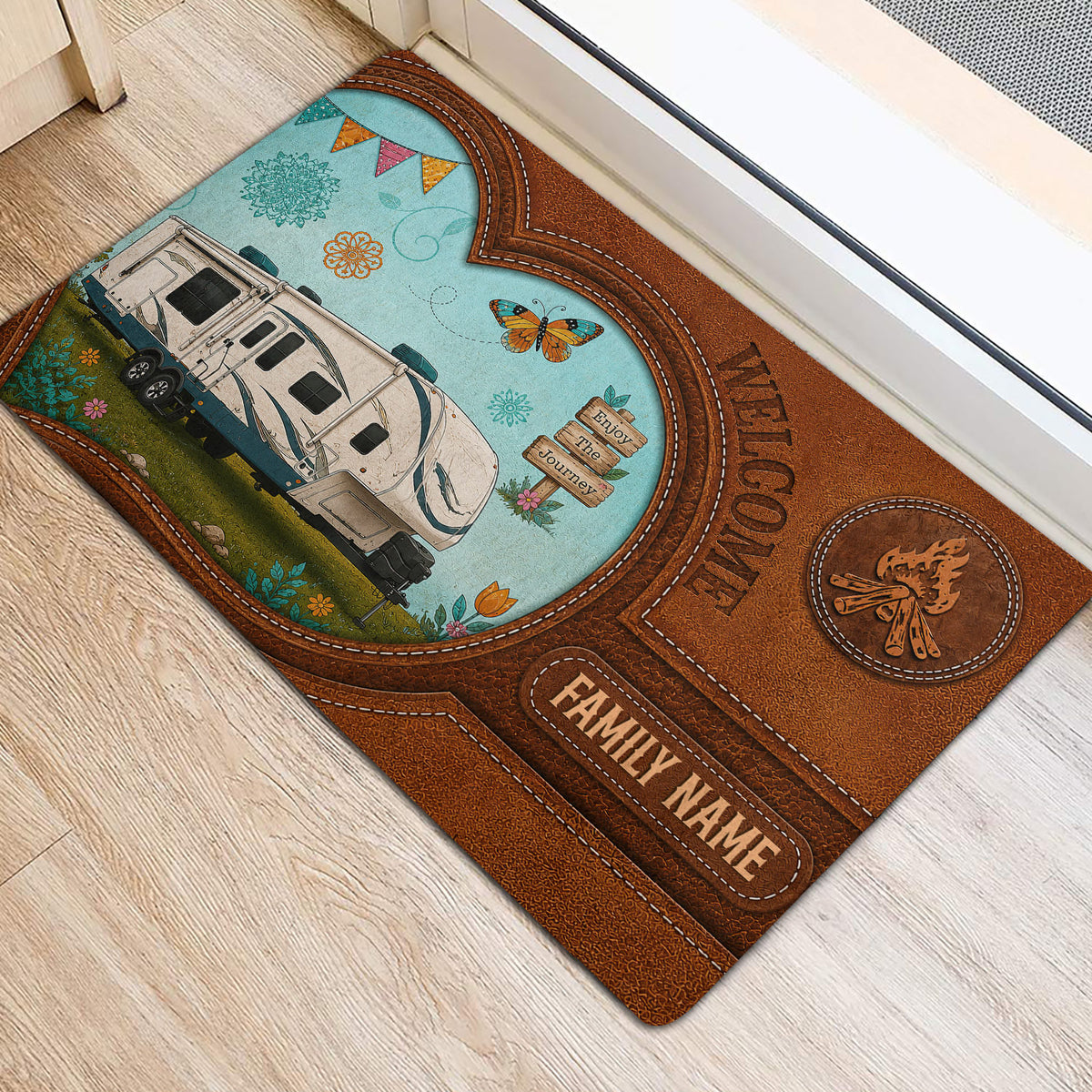 Camping doormat shown at an entrance with a travel trailer scene, butterfly, campfire, and welcome design