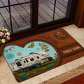 RV camping doormat styled inside a home entrance with a travel trailer scene and warm rustic colors