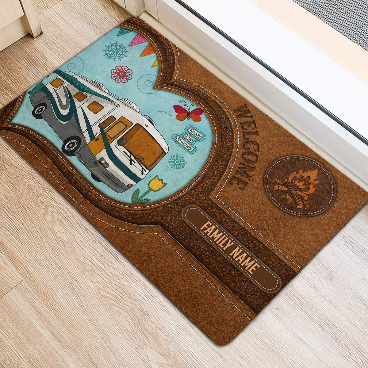 RV camping doormat shown at an entrance with colorful travel artwork, rustic borders, and campfire details