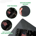 Close-up of veteran doormat artwork and rubber backing showing military boots, dog tags, and patriotic details