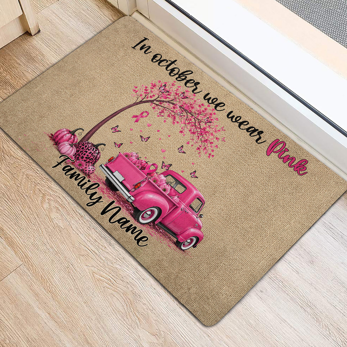 Breast cancer awareness entryway rug with pink tree, pumpkins, butterflies, and vintage truck design