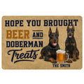 Doberman doormat featuring two dogs, beer artwork, and a humorous entryway design