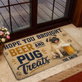 Beer-themed pug doormat welcoming guests at a glass door entryway