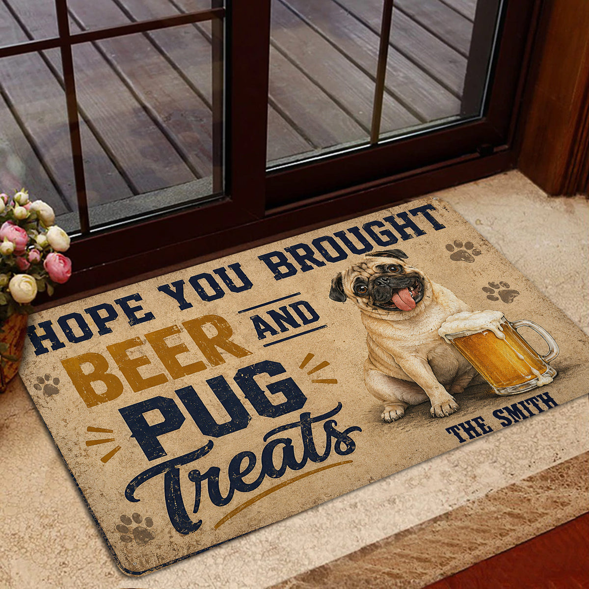Beer-themed pug doormat welcoming guests at a glass door entryway