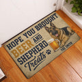 German Shepherd beer-themed doormat displayed in a bright entryway beside a white door