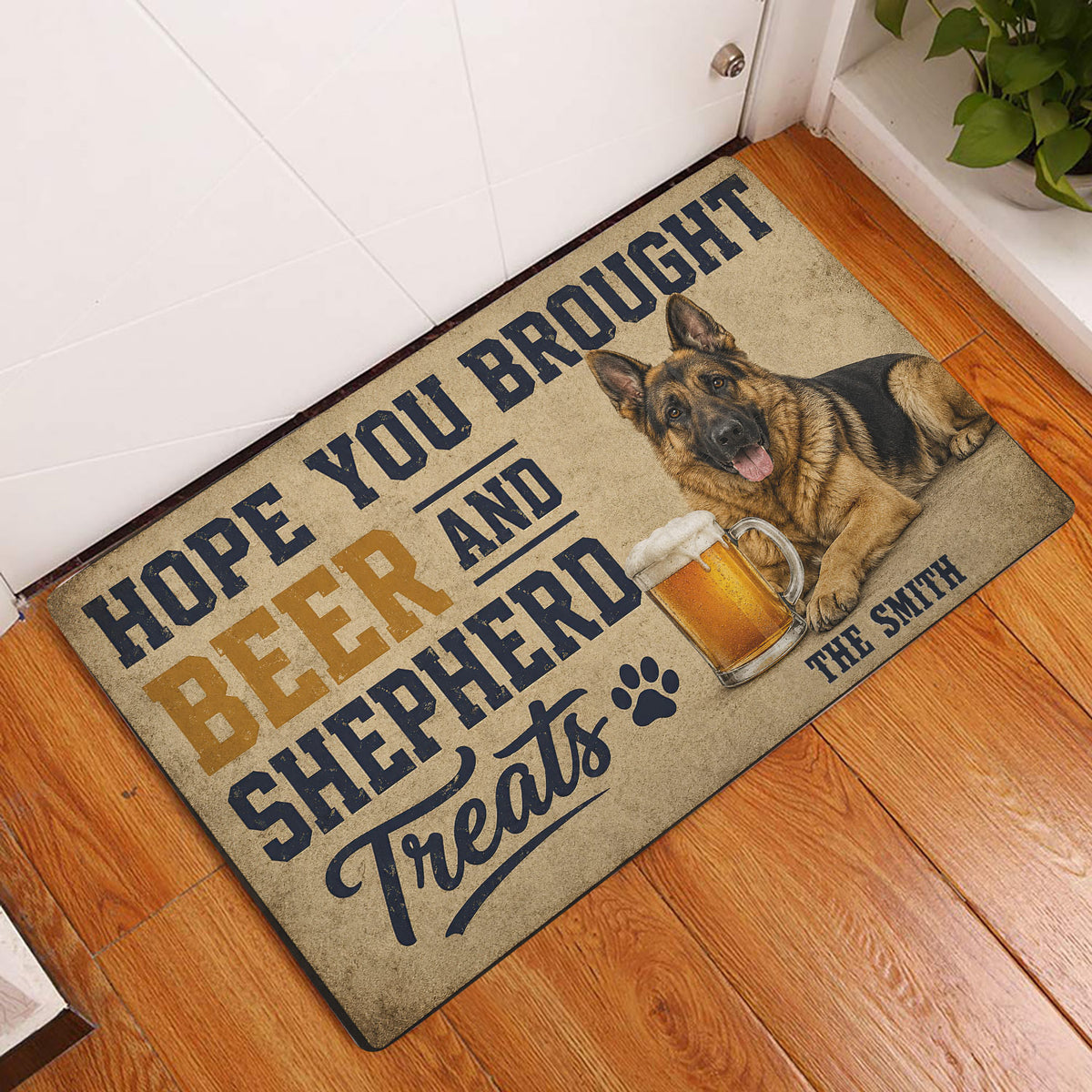 German Shepherd beer-themed doormat displayed in a bright entryway beside a white door