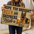 Person holding a German Shepherd doormat featuring a beer mug, paw print, and bold vintage lettering