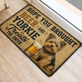 Yorkshire Terrier doormat styled beside a doorway with vintage lettering and beer artwork