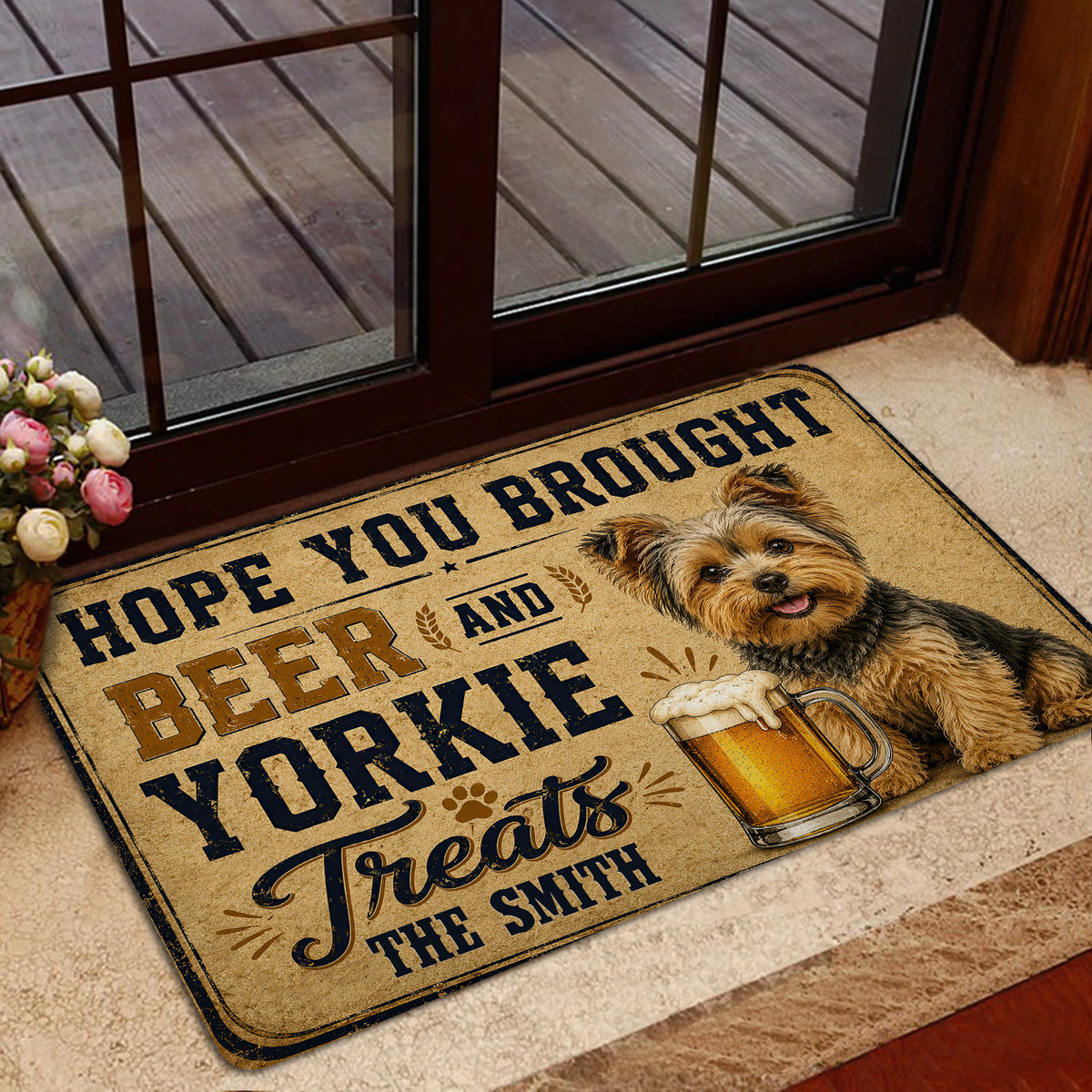 Yorkie welcome doormat displayed near a glass door in a warm home entryway