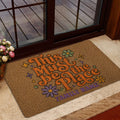 Hippie doormat presented at a home entrance with colorful floral artwork and retro peace lettering