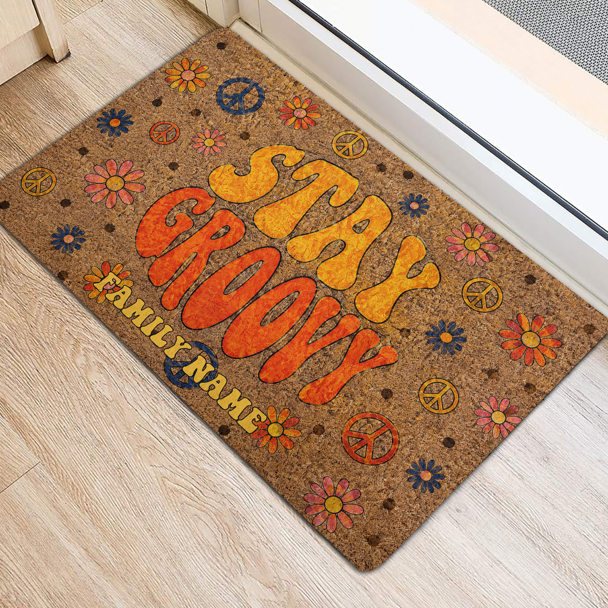 Retro peace sign and daisy doormat placed beside a light-colored front door