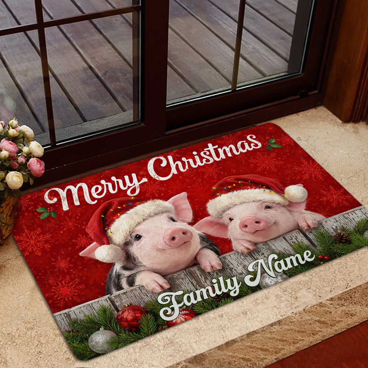 Christmas pig door mat shown in a home entrance with red snowflake artwork, greenery, and holiday ornaments