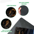 Close-up detail of Rottweiler doormat artwork with rubber backing and textured printed surface