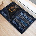 Rottweiler door mat displayed beside a light-colored doorway with bold blue and white lettering