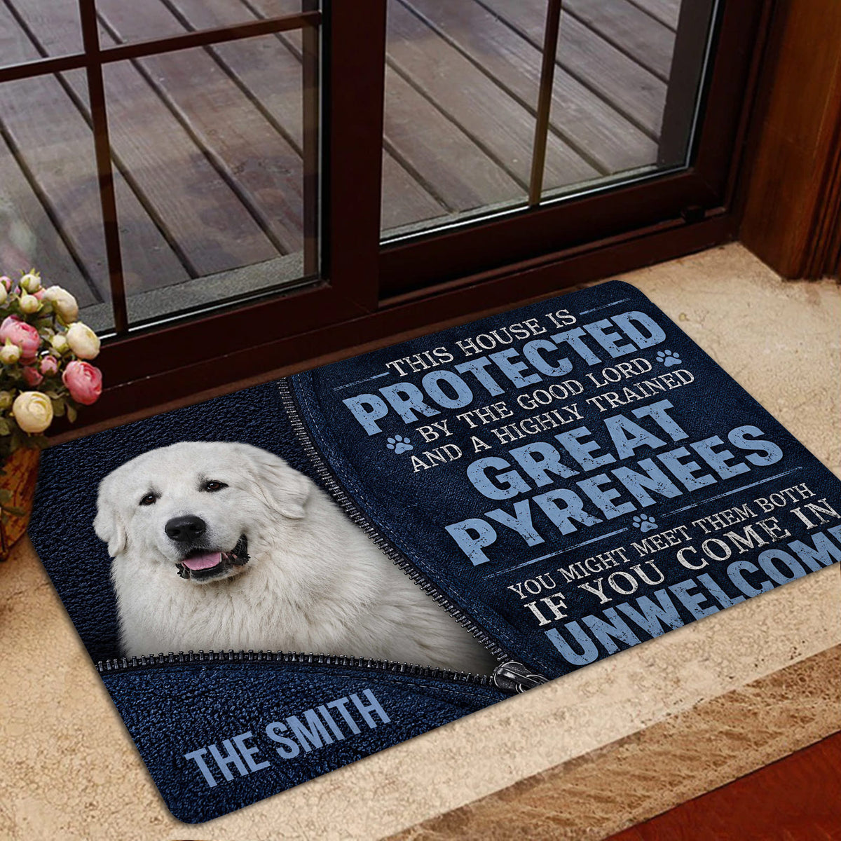 Great Pyrenees entryway mat shown beside a glass door in a home entrance