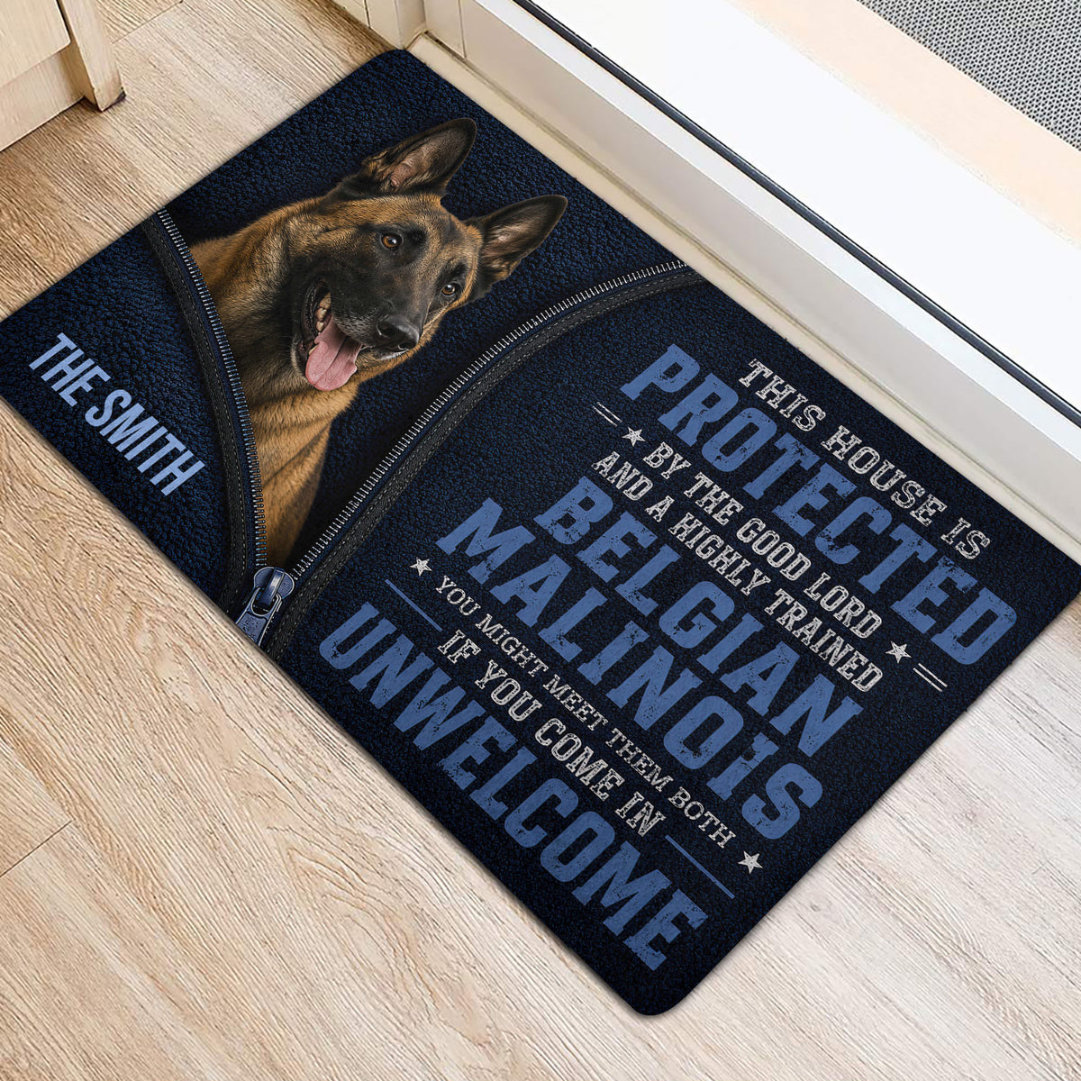 Belgian Shepherd door mat displayed near a bright entry door with realistic dog artwork and bold blue lettering