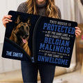 Belgian Shepherd doormat held indoors, showcasing the detailed dog portrait, zipper design and bold graphic lettering